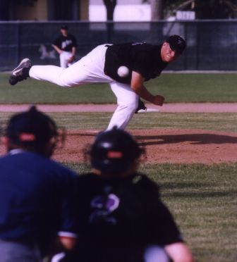 A pitcher throwing a baseball